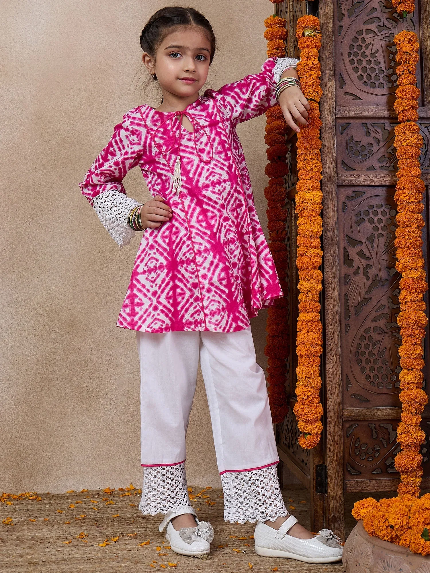 Girls Geometric Printed Tie-Up Neck A-Line Kurta With Trousers