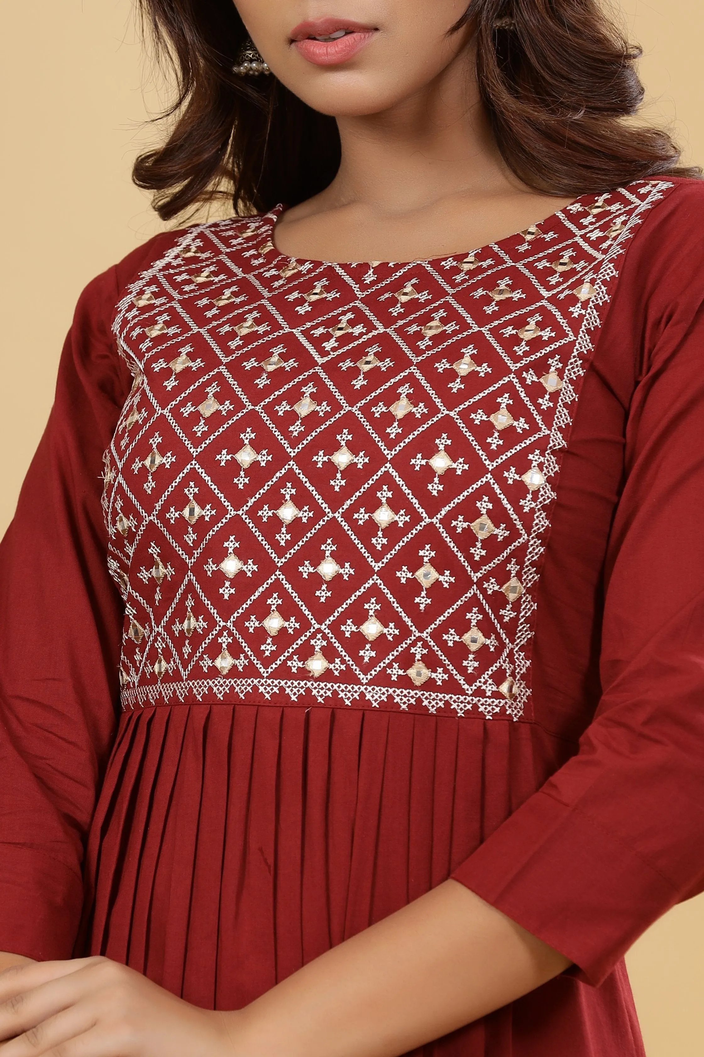 Women Maroon Solid Embroidered Dress